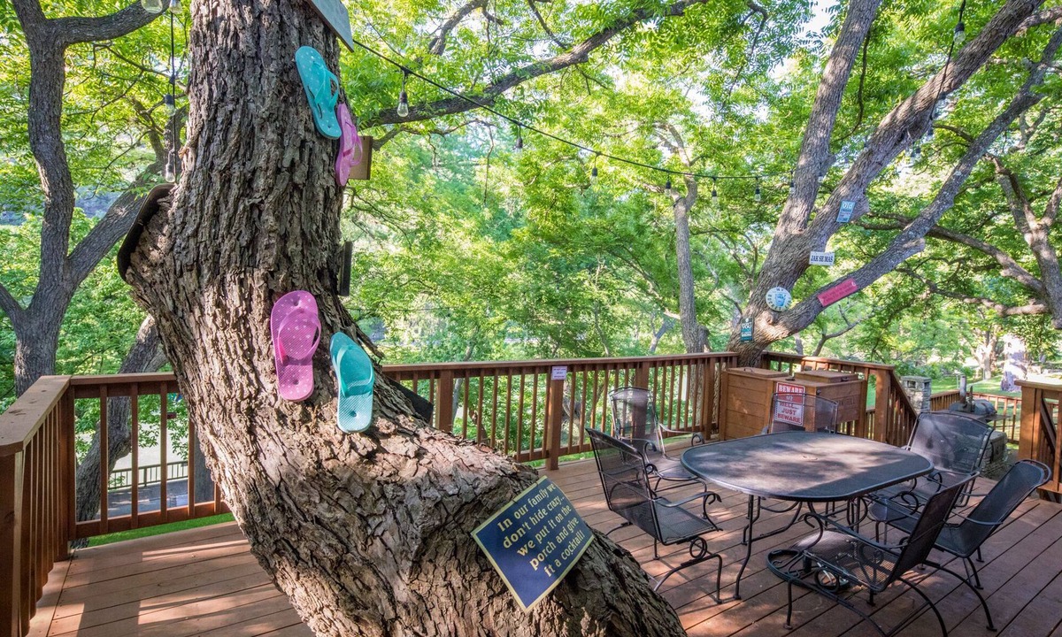 New Braunfels House | Bohemian Hill: NB Cypress-Lined Guadalupe Riverfront + Main & Guest House + Shady Decks & Backyard