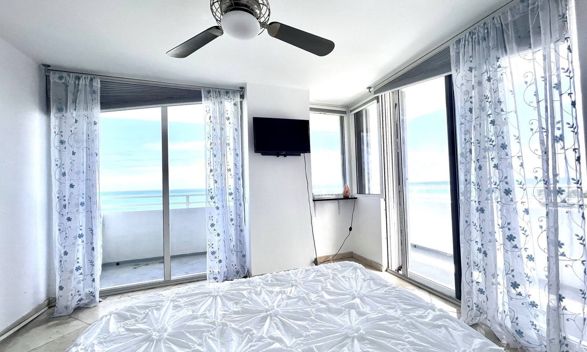 Surfside Condo | Direct ocean view condo with 2 wrap around balconies.