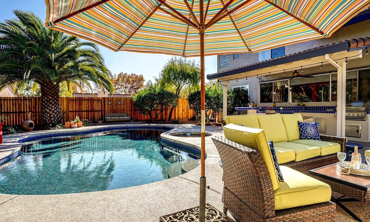 Windsor House | Wine Country Retreat. Large backyard with pool/spa, outdoor kitchen & fireplace