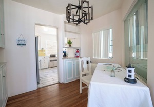 BEACHFRONT COTTAGE ON THE WATER TWO BEDROOM ONE BATH UPPER UNIT