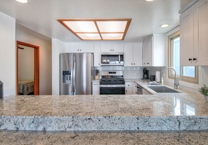 Fabulous upper unit on a fabulous street just one house from the beach!