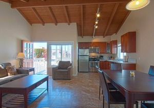 Fantastic and newly-remodeled upper unit just one house from the warm sand