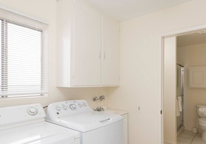 Newly remodeled bayside home directly on the beach with rooftop deck, W/D, & AC