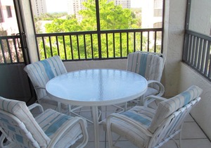 OUTSTANDING LOCATION. End Unit Top Floor Condo near Beach, favored Pelican Bay