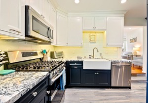 Quiet, ground-floor beach bungalow steps from the water with enclosed patio & AC
