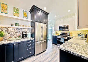 Quiet, ground-floor beach bungalow steps from the water with enclosed patio & AC