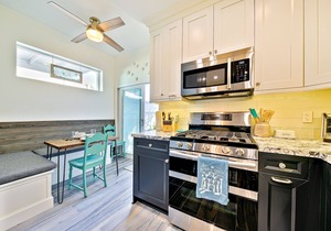 Quiet, ground-floor beach bungalow steps from the water with enclosed patio & AC