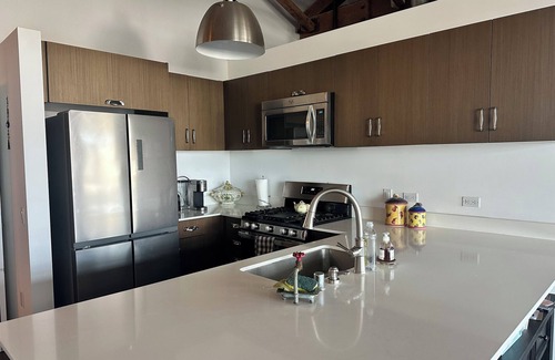 Arts District Condo | Cozy 2-bedroom Arts District Loft with WiFi, fitness room, rooftop pool