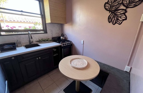 Marina District House | Elegant street-facing room with a private kitchen