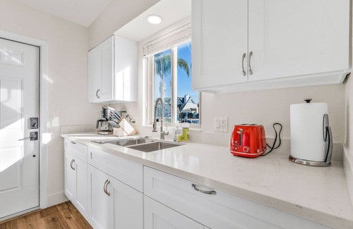 Crown Point House | Newly remodeled PB Home w/AC, King Beds - 2blocks2beach - Sleeps 24 - Parking