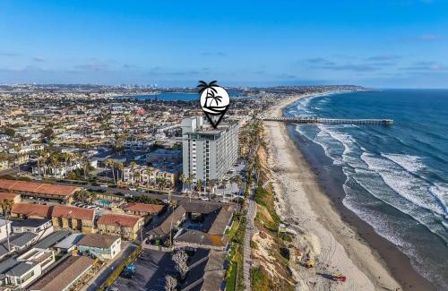 North Pacific Beach House | Oceanfront Paradise with Sunset Balcony, Pool, Spa, Beach Access and Parking