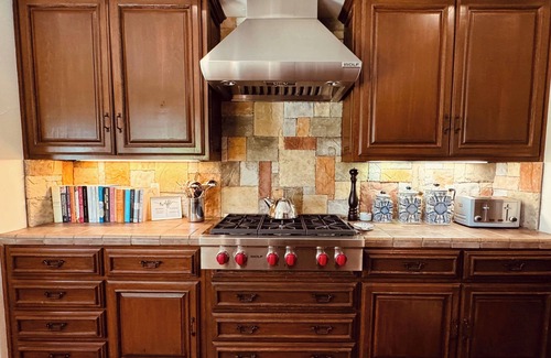 Palm Springs House | Outdoor Shower, Swim-Up Wetbar, Spa, Putting Area, Firepit, EV Charger