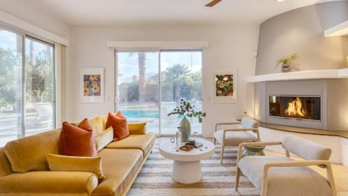 Bermuda Dunes House | Pool Hot Tub Yard Games Chic Midcentury Design Painted Sand by AvantStay