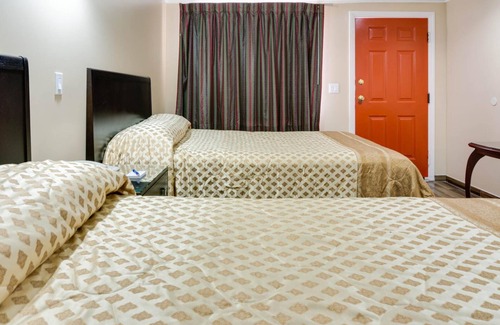 Orange Hotel | Sky Palm Motel