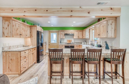 West Village House | Wonderful Retreat Near the Lake W/ Gourmet Kitchen, Free WIFi & Wraparound Deck!