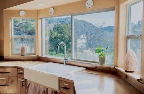 Cornville House | A high-design primary residence designed for slow mornings and creative resets in Page Springs. 3 king beds and pull out couch can accommodate up to 8 guests.