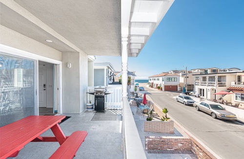 West Newport Condo | A Newport Beach Standout! | Roomy Interior w/Ocean View | Cool, Beachy Details | Walk to it All!