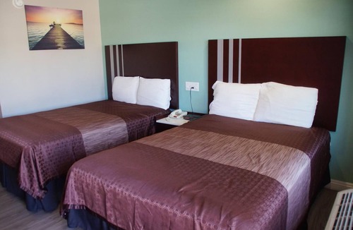 East Village Hotel | Beach Inn Motel