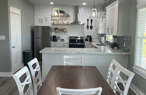 Port Bolivar Cabin | Beautiful Canal front Cabin, Golf Cart Ride to Beach, 2 miles New Rollover Pier