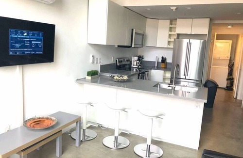 University Heights Condo | CasaViva Loft Modern 2BR Garage Parking, In-Unit W/D & ADA Access, walk to Eats