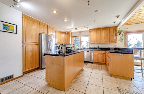 Fortuna House | Charming home with game room, full kitchen, washer/dryer, & patio - dog-friendly