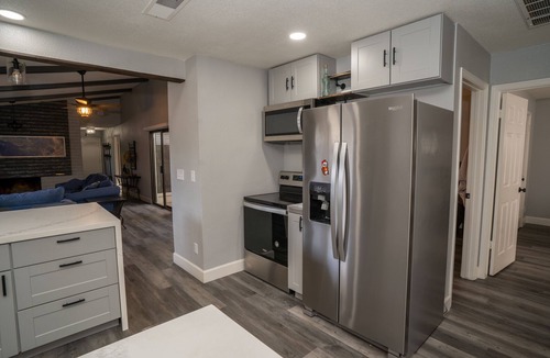 Raisin Condo | Chic condo with pool access- and beautiful courtyard inside home