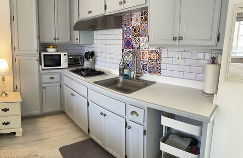 Davis Apartment | Chic Private Cottage with a pool and hot tub.