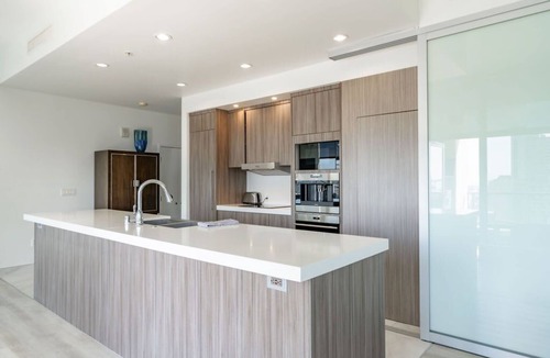 East Village Condo | Cityscape Elegance with Water Views