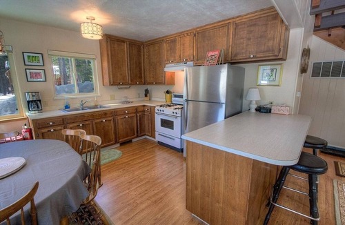 Country Club Estates House | Cozy Cabin 4 Bedroom Home by RedAwning