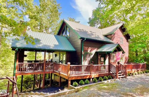 Ridgeline Vistas Cabin | Cozy mountain views, 4 king beds, hot tub, game room, fire pit, porch fireplace