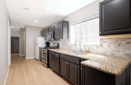City Heights House | Cozy Pet Friendly Escape with Outdoor Dining