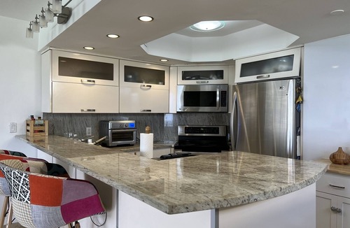 Surfside Condo | Direct ocean view condo with 2 wrap around balconies.