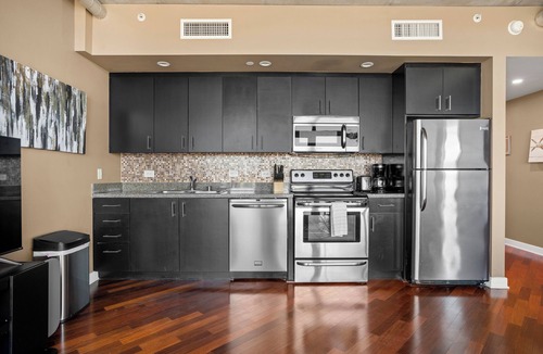 Civic Core Condo | Elegant 1 Bedroom in a Prime Location Free Parking & Wifi!