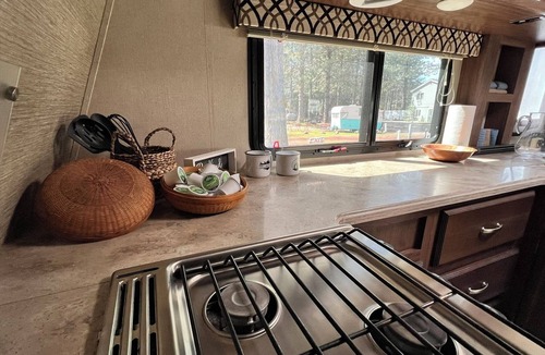 Weed House | Fully Equipped Travel Trailer in beautiful campground setting.