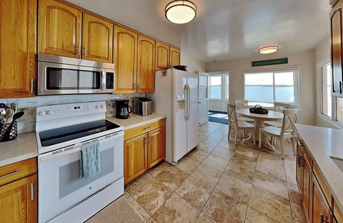 Crown Point House | Gorgeous Waterfront Sail Bay Home with Amazing Westward facing Bay and Sunset Views!