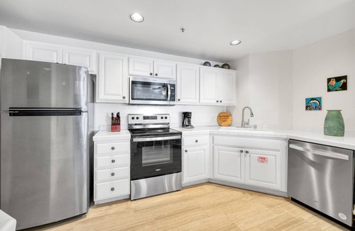 Avalon Condo | H157: Bright Villa, Sweeping Ocean Views, Golf Cart, WIFI