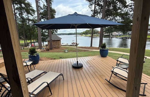 Eatonton House | Lakefront, Dock, Kayaks, Paddleboards, Pool,Hot tub and access to boat rentals!