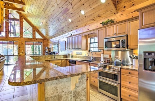 Blairsville Cabin | Lakefront Log Cabin w/Private Dock, Hot Tub, Water Toys And Arcade Room