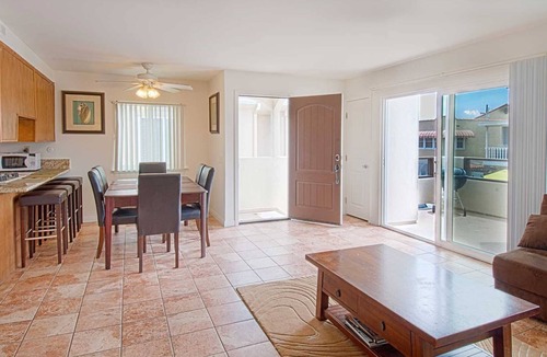 West Newport Condo | Lovely upper unit with amazing balcony for grilling & chilling