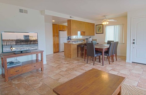 West Newport Condo | Lovely upper unit with amazing balcony for grilling & chilling