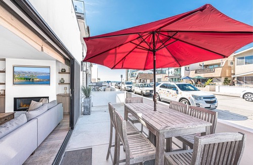 West Newport Condo | Modern Ocean View Beauty | Air Conditioning | Fabulous Indoor/Outdoor Living | 1 Block to the Beach!
