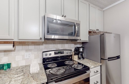 Banner Elk Condo | Mountain condo w/ a wood-burning fireplace & access to a pool, hot tub, & sauna!