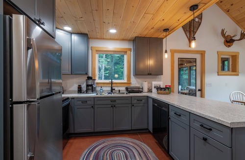 Wyman House | Newly built custom home nestled on the edge of the Bigelow Preserve