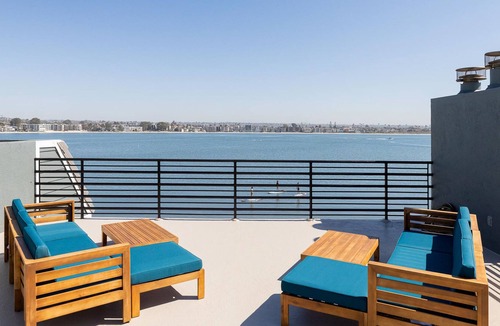 Mission Beach House | Newly remodeled bayside home directly on the beach with rooftop deck, W/D, & AC