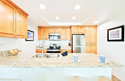 Balboa Peninsula House | Newport condo on the boardwalk with oceanfront balcony & views