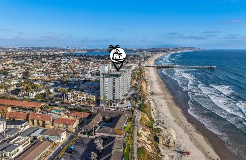 North Pacific Beach House | Oceanfront Paradise with Sunset Balcony, Pool, Spa, Beach Access and Parking