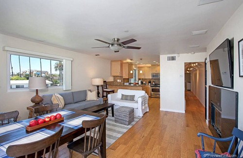 Townsite Condo | OCEANSIDE BEACH located by pier and marina! Ocean Views! Walk to Village!