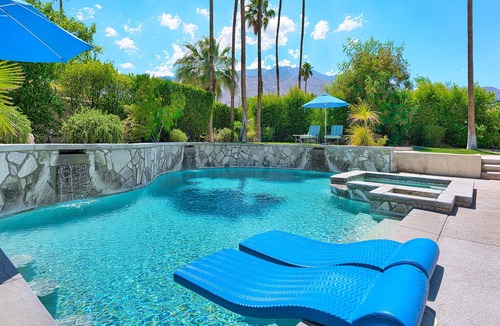 Palm Springs House | Outdoor Shower, Swim-Up Wetbar, Spa, Putting Area, Firepit, EV Charger