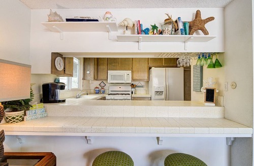 West Newport Condo | Perfect Family Beach House! | 3 Houses From the Beach! | Fun Tropical Interior!