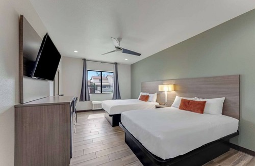 Eastside Promise Neighborhood Hotel | Pet-Friendly Room w/Free Breakfast Near Alamodome – Ideal for Events & Games